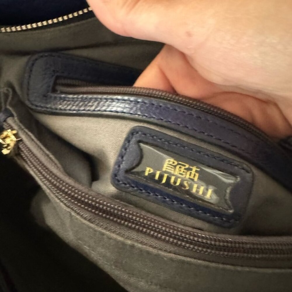 Blue top handle PIJUSHI bag, sorry no strap.